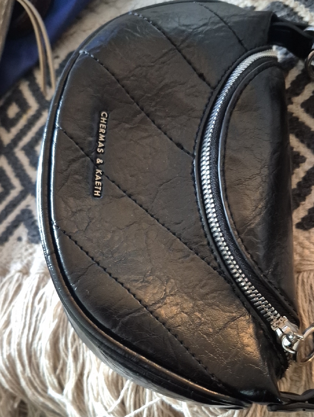 Charles & Keith Black Quilted Crescent Bag with Silver Hardware